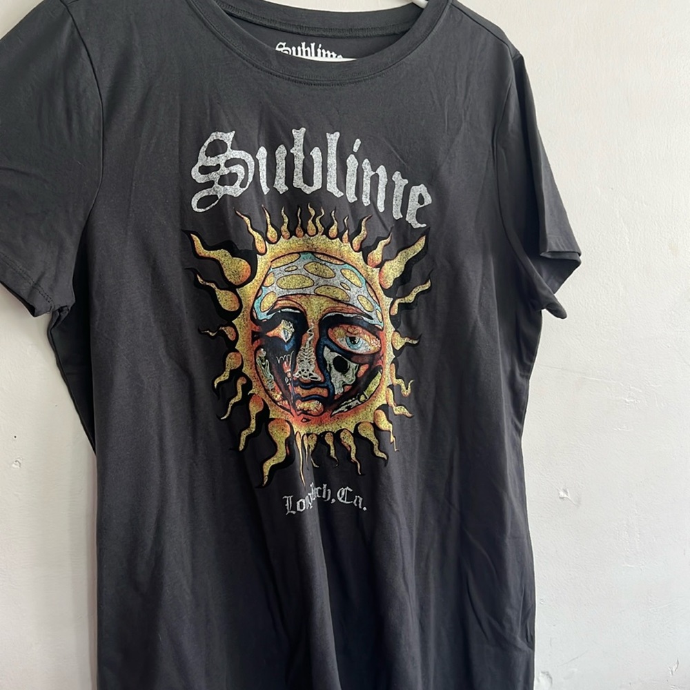 Brand new sublime women’s t shirt. No tag’s but never worn or washed.